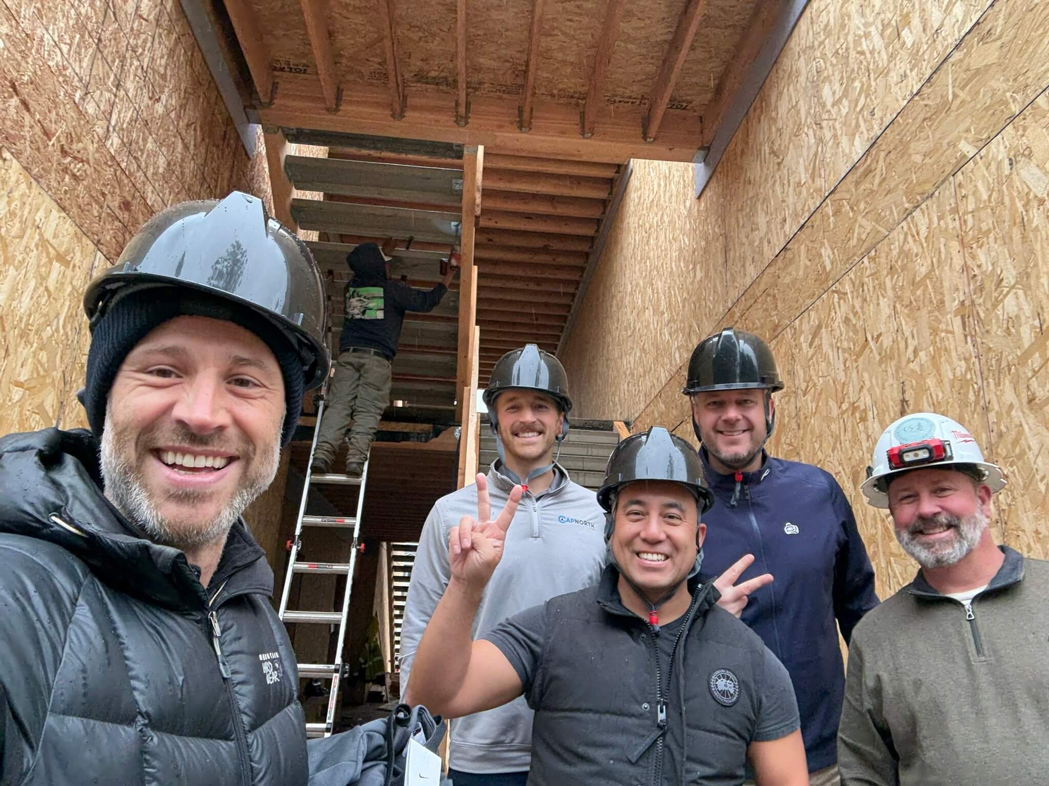 Dr. Josh Cochran with a construction team on site